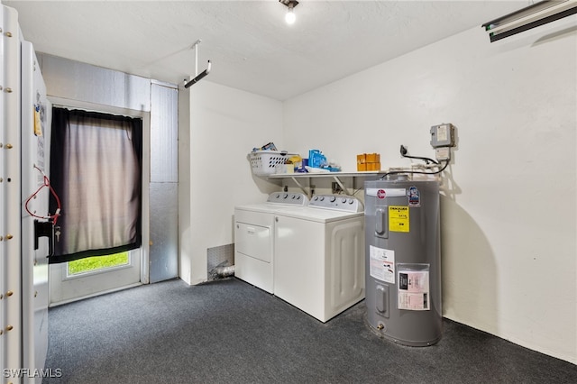 laundry area featuring water heater and washer and dryer