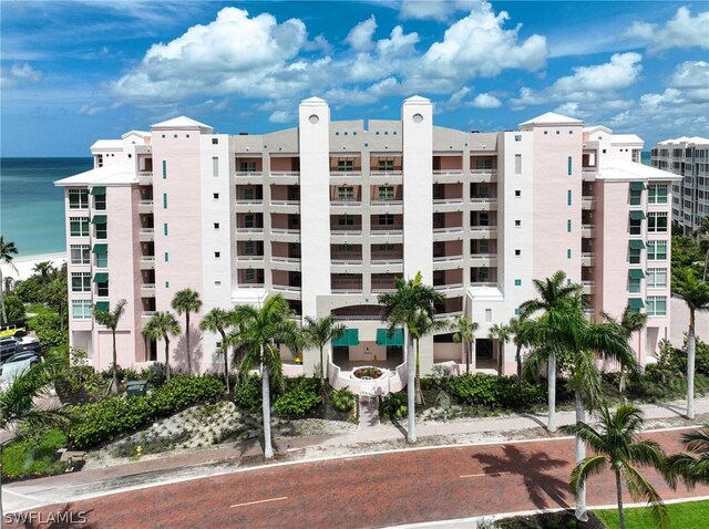 view of building exterior with a water view