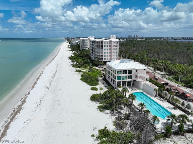 bird's eye view featuring a beach view and a water view