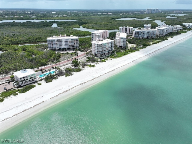 bird's eye view with a beach view and a water view