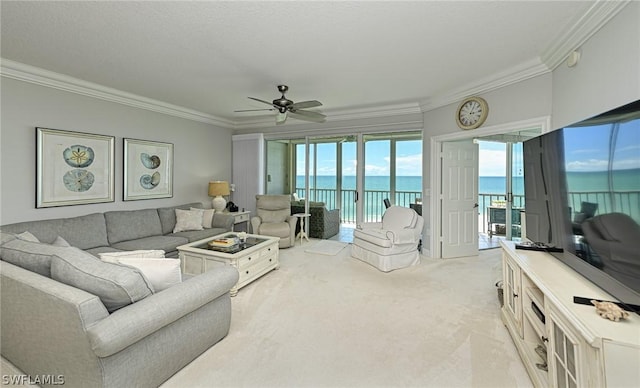 living area featuring light carpet, ceiling fan, and ornamental molding