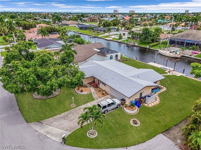 drone / aerial view featuring a water view