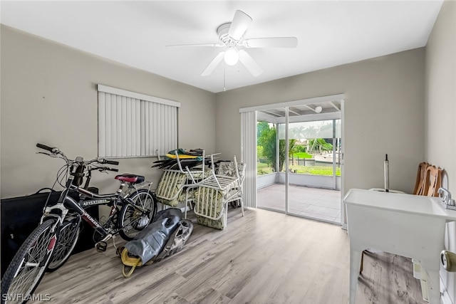 interior space featuring ceiling fan and wood-type flooring