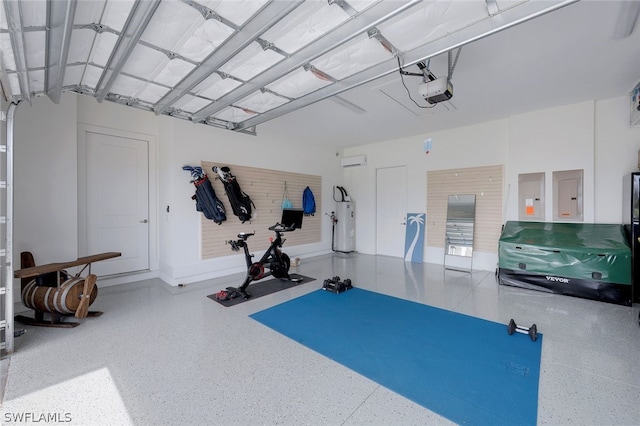 exercise area featuring electric panel and water heater