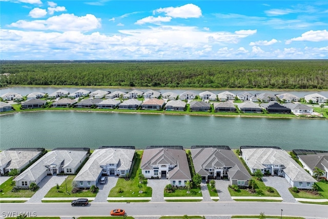 birds eye view of property featuring a water view