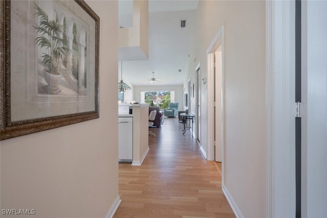 hallway featuring light wood-type flooring