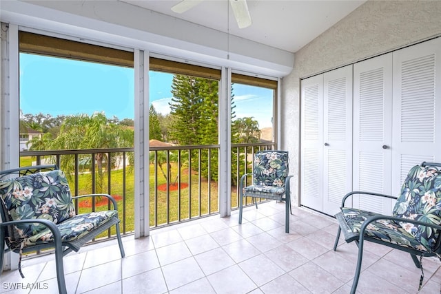 sunroom / solarium with ceiling fan