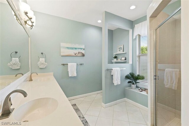 bathroom with shower with separate bathtub, dual vanity, and tile floors