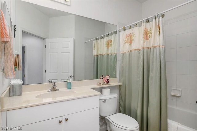 full bathroom with vanity, toilet, and shower / bath combo