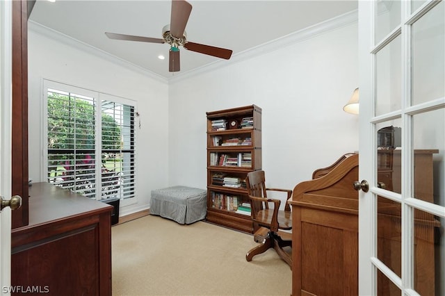 office space with ceiling fan, light colored carpet, crown molding, and french doors