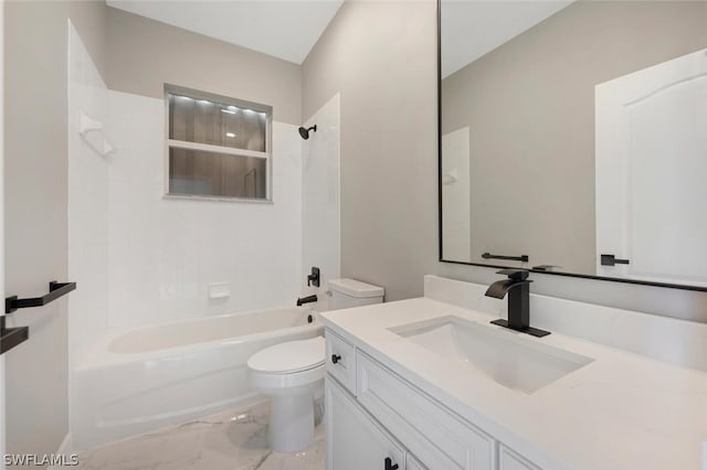 full bathroom featuring vanity, toilet, and tiled shower / bath