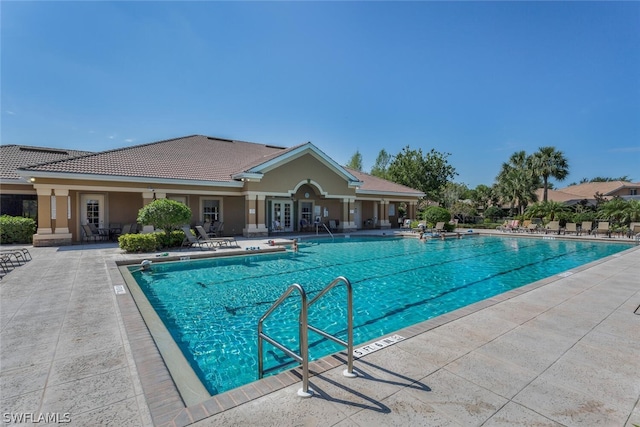 view of pool featuring a patio area