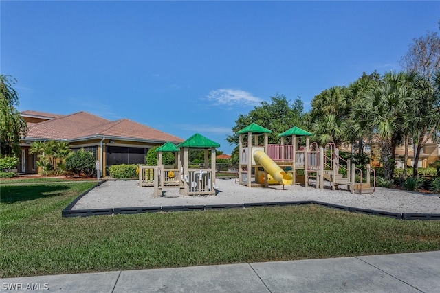 view of play area featuring a lawn