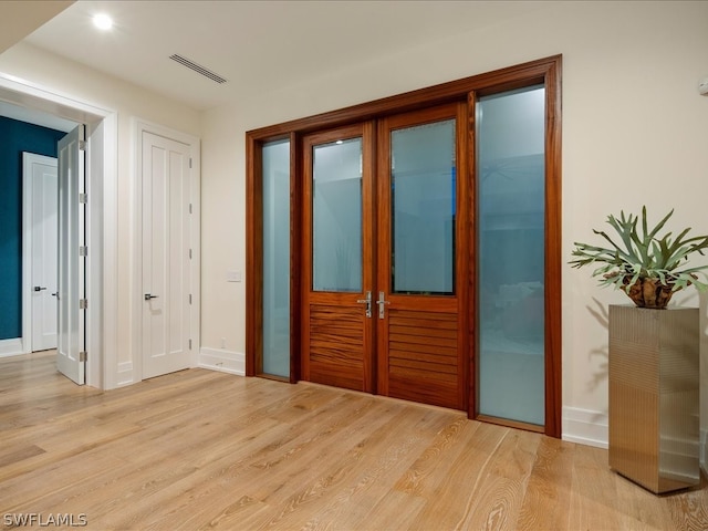 interior space with light hardwood / wood-style flooring