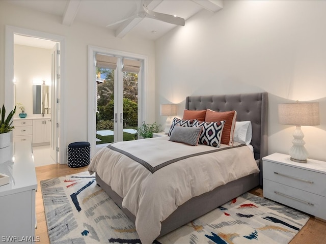 bedroom with beam ceiling, access to exterior, ensuite bathroom, and light wood-type flooring