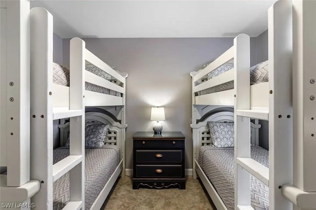 bedroom featuring light tile patterned floors