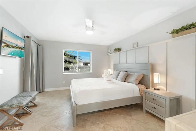 bedroom featuring ceiling fan and light tile patterned floors