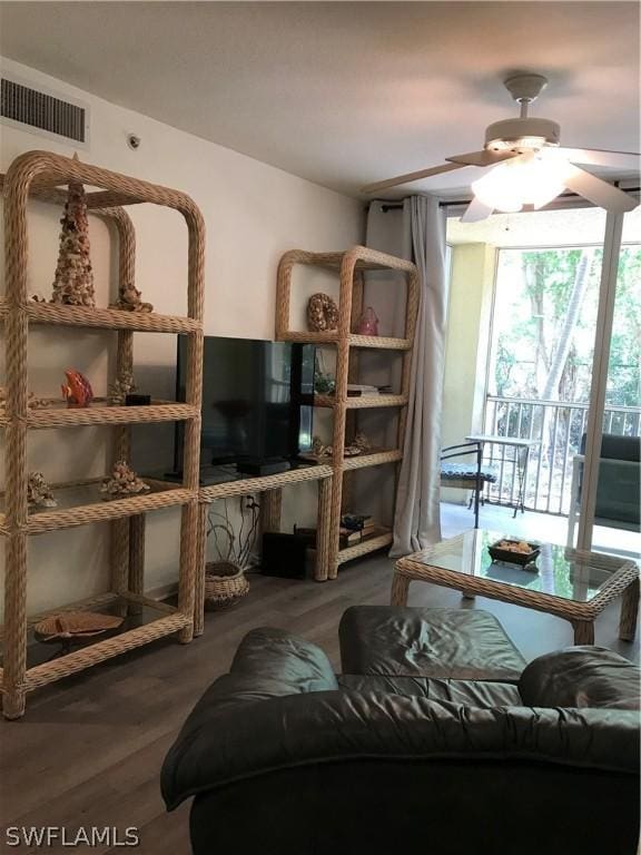 4122 Residence Dr Unit 102, Fort Myers, FL 33901 - living room featuring ceiling fan and wood finished floors