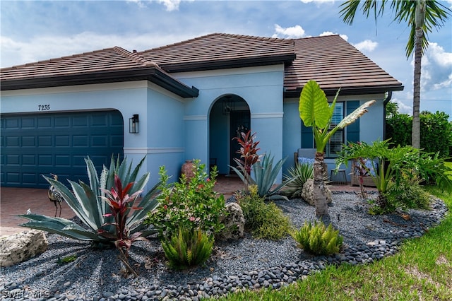 view of front of house with a garage