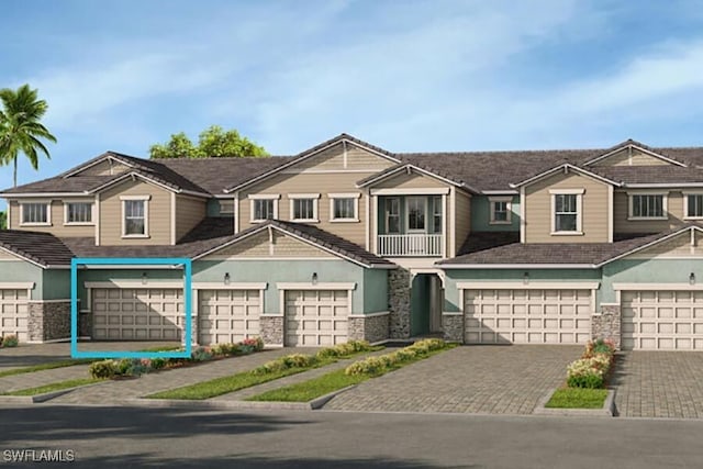 view of property featuring a residential view, driveway, and stucco siding