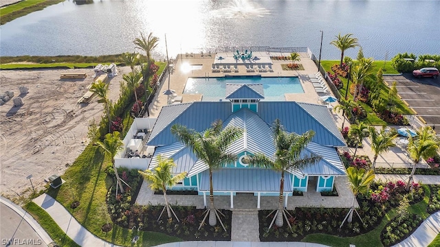 birds eye view of property featuring a water view