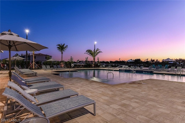 community pool featuring a patio area