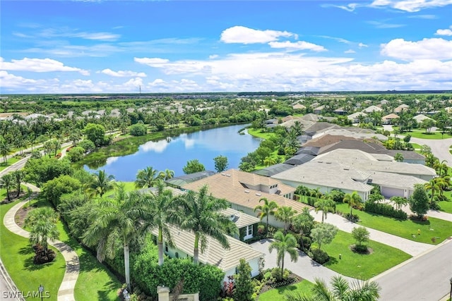 drone / aerial view with a water view