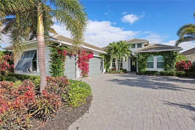 view of front of property with a garage