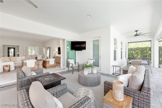 living room featuring ceiling fan