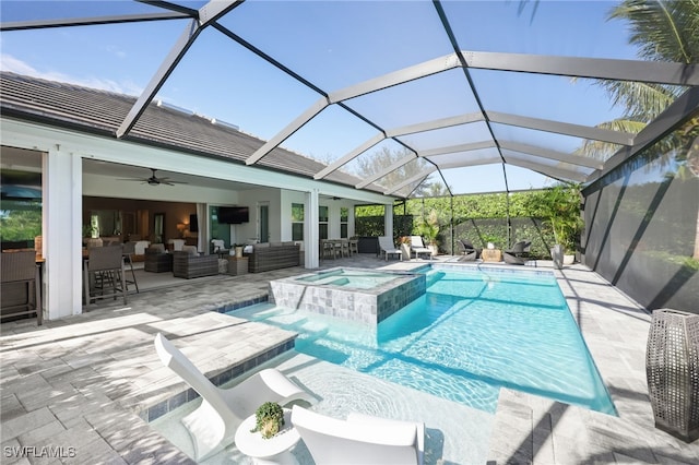 view of pool with ceiling fan, a patio area, an outdoor hangout area, and glass enclosure