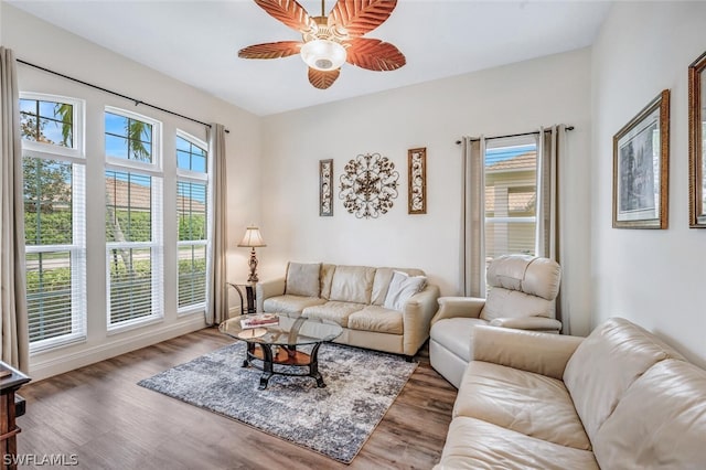 living room with ceiling fan, a healthy amount of sunlight, and hardwood / wood-style flooring