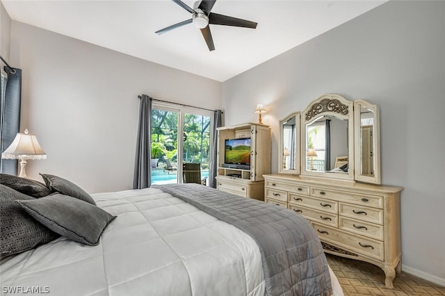 bedroom featuring ceiling fan, access to exterior, and parquet floors