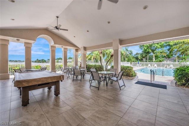 view of patio featuring ceiling fan and a community pool