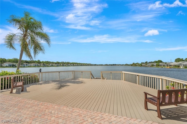 wooden terrace with a water view