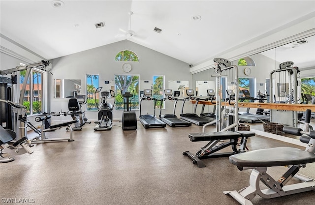 gym with ceiling fan and high vaulted ceiling