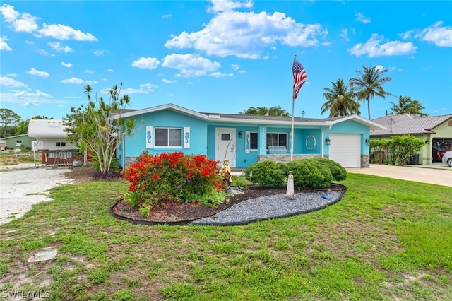 ranch-style home with a front lawn, a porch, and a garage