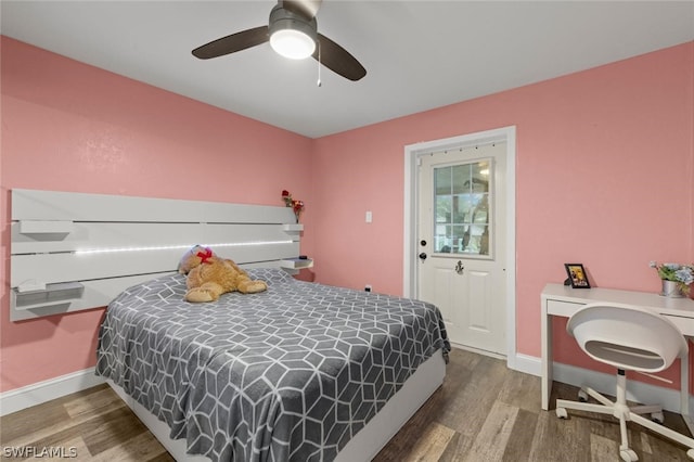 bedroom featuring ceiling fan and hardwood / wood-style floors