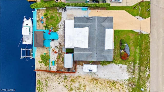 bird's eye view with a water view