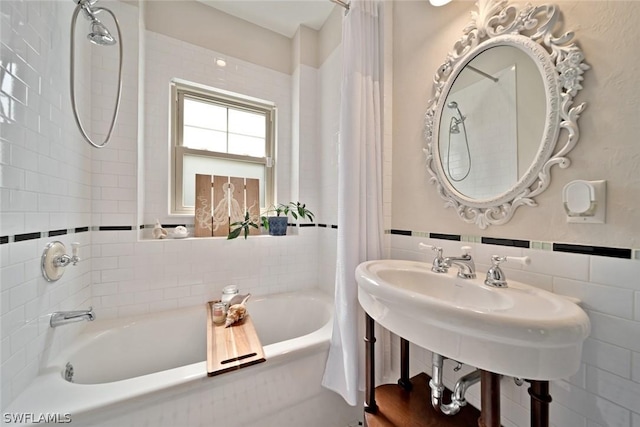 bathroom with tile walls