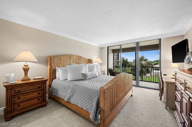 bedroom with expansive windows, crown molding, access to outside, and light carpet