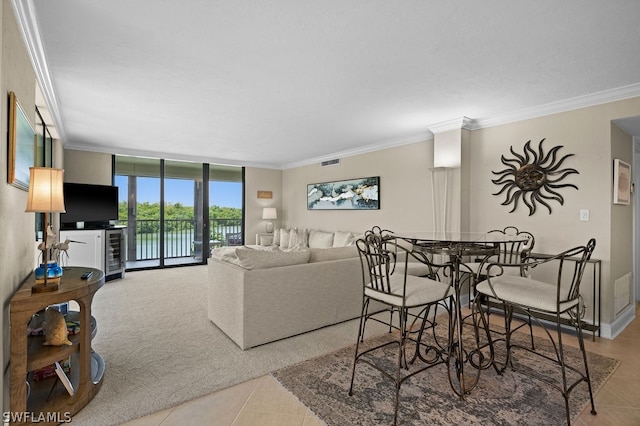 living room featuring light tile patterned floors, expansive windows, and ornamental molding