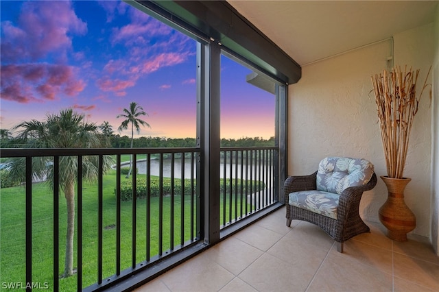 balcony at dusk with a water view