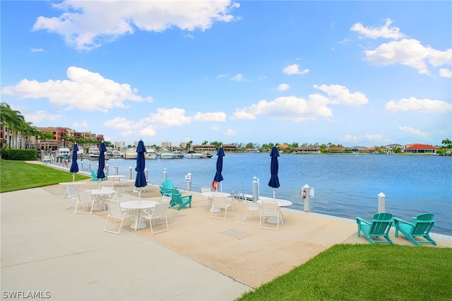 view of patio / terrace with a water view