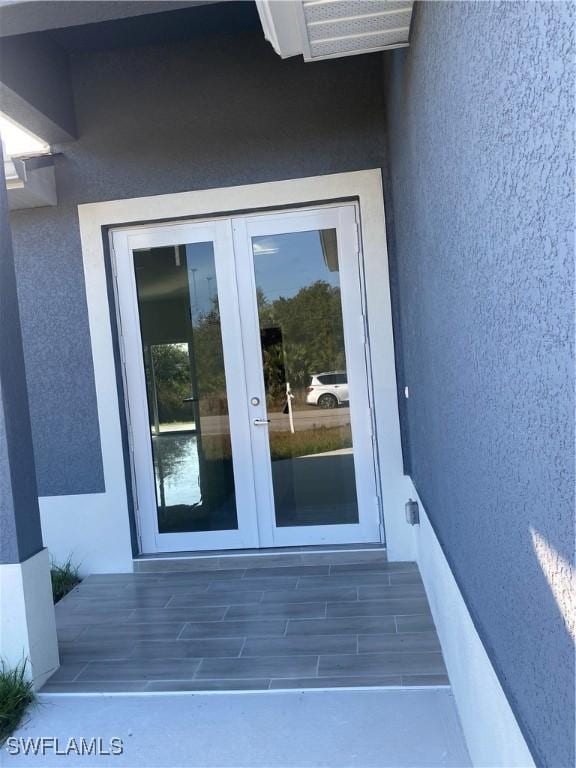 entrance to property with french doors