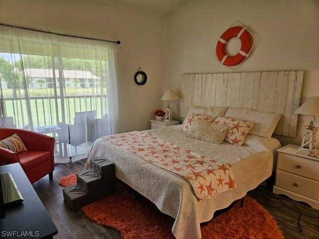 bedroom featuring dark hardwood / wood-style floors