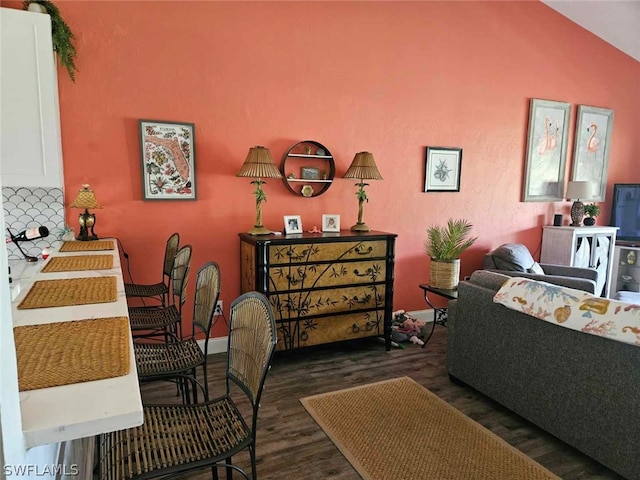 living room with dark hardwood / wood-style flooring