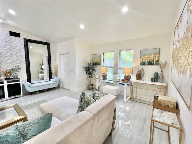 living room with lofted ceiling