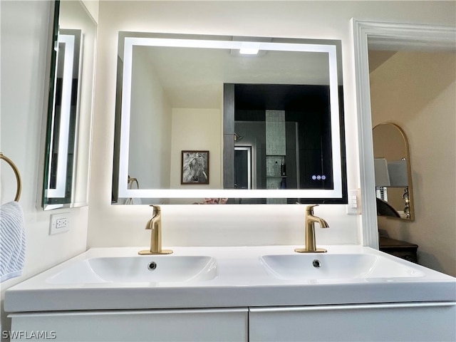 bathroom with dual bowl vanity