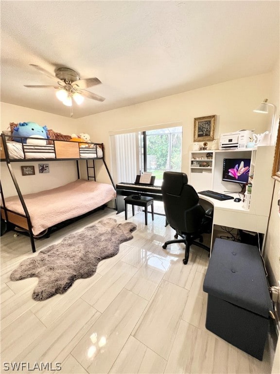 bedroom featuring ceiling fan