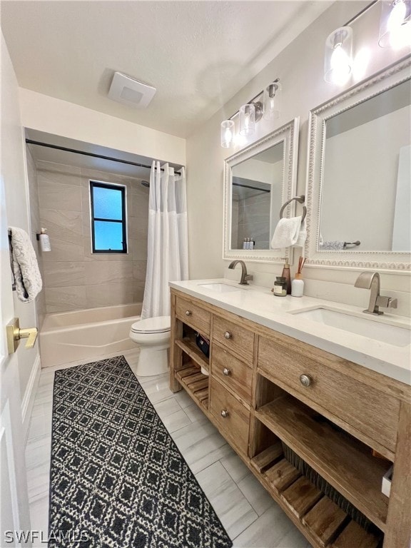 full bathroom featuring oversized vanity, toilet, tile floors, shower / bath combination with curtain, and double sink